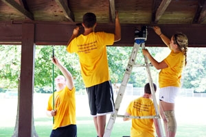 Photo of Students Working at Into the Streets Event