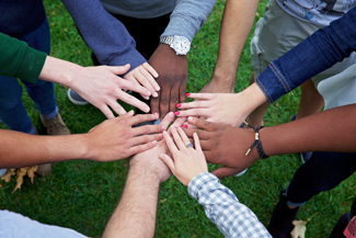 Photo of Diverse Group of Student Hands