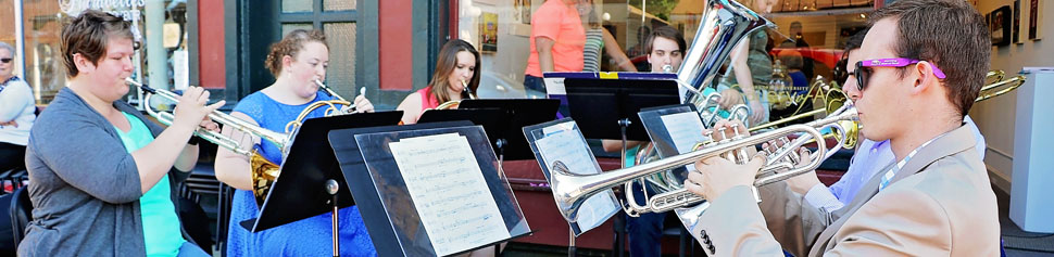 Students Playing Music in Front of the Art Gallery