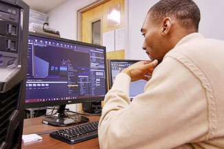 Jacob Troutman '18 Working at Computer Photo of Jacob Troutman '18 Working at Computer