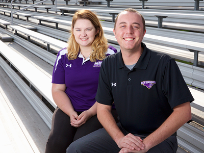 Photo of Abigail Schlueter '17 and Austin Lagesse '17 Sitting in Bleachers