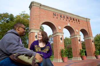 Students talking at the Entryway Monument