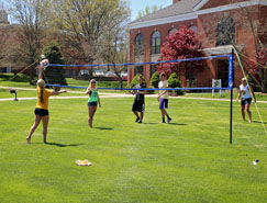Photo of Students Playing Volleyball on Campus Quad