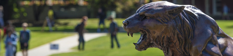 Bearcat Statue in the Campus Quad with Students in Background